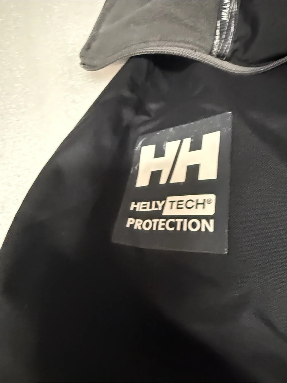 Helly Hansen Black Ski Jacket with Pink and White Accents